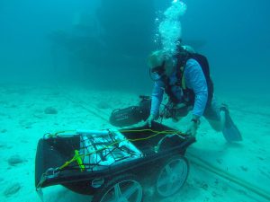 Setting up the tool sled that will be used during EVA excursions to carry the necessary research equipment