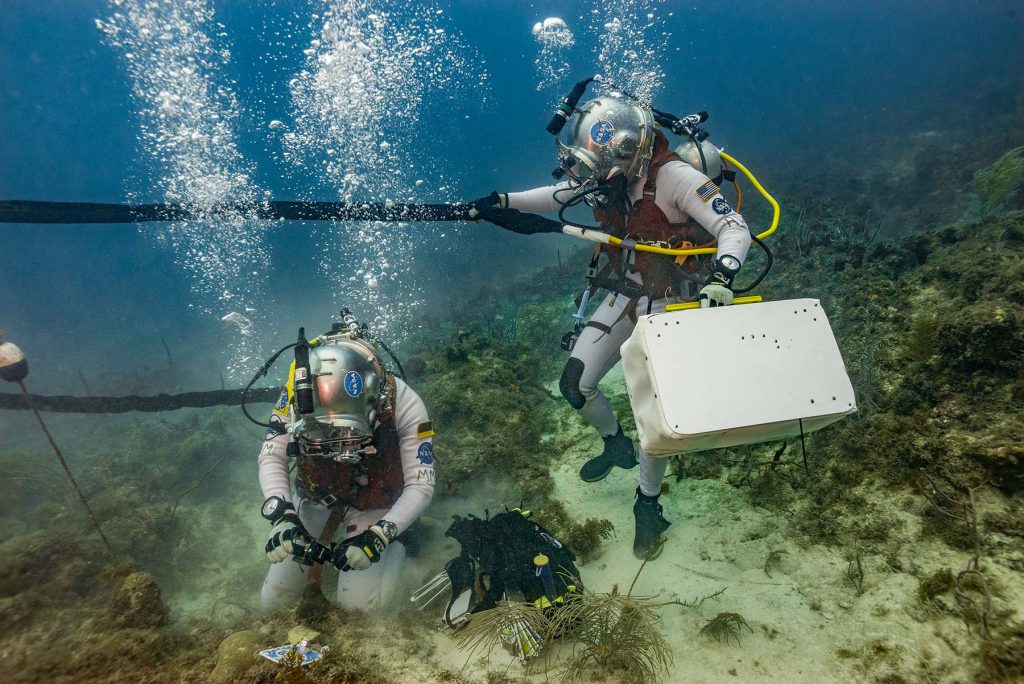 Matthias and Reid working as a team to identify coral and collect PAM data