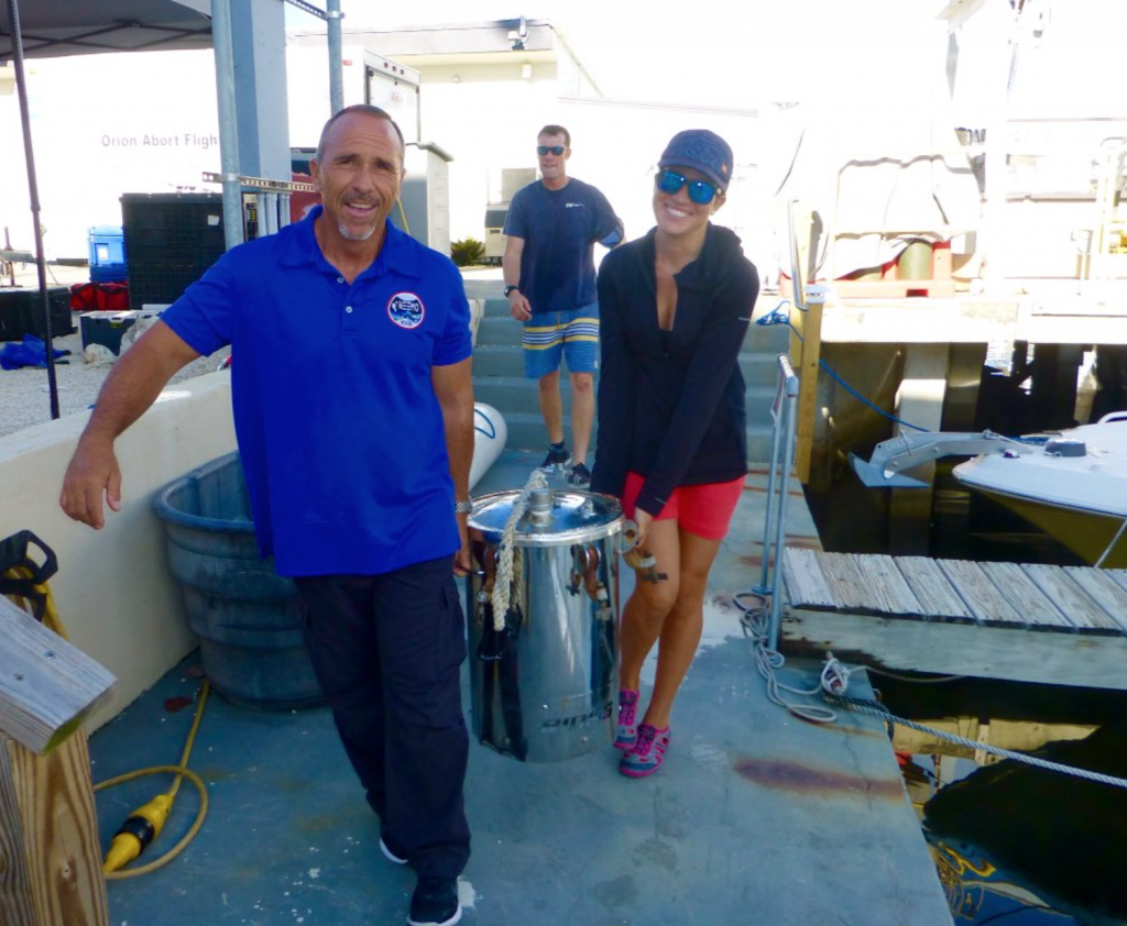 Roger Garcia, Ivana Sanchez, and Tom Horn loading pots filled with supplies heading to the habitat