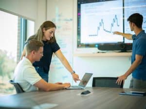 U.S. Air Force Academy Cadets Katherine Judy, Connor Manion, and Weiss O'Connor discuss findings from their data analysis on the AFOSR ROPER project with IHMC Researcher Dr. Kevin Gluck. Photo Credit: IHMC